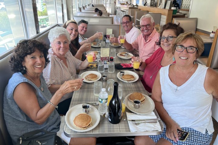 a group of people sitting at a table