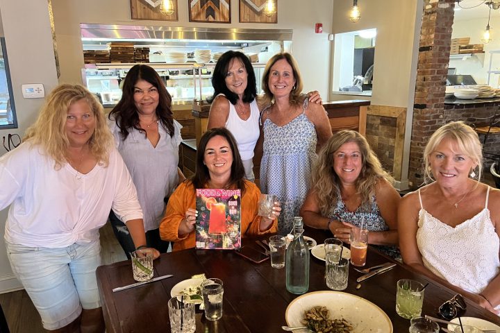 a group of people posing for a photo