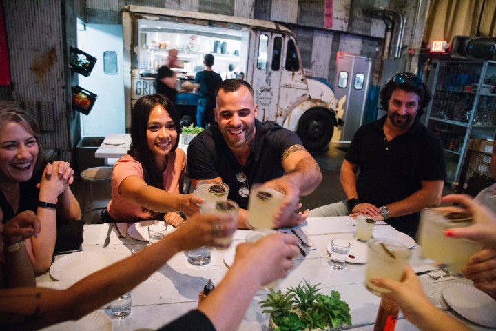 a group of people sitting at a table