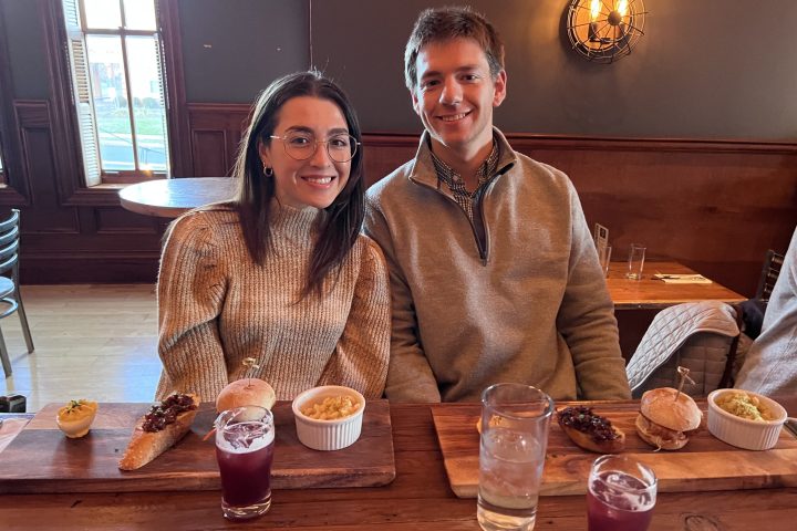 a person sitting at a table in a restaurant