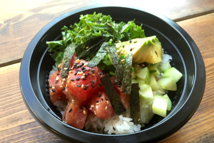 a bowl of food with broccoli