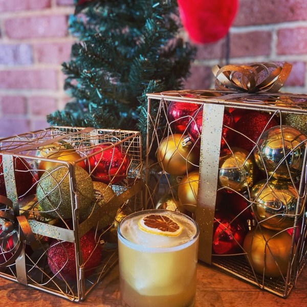 a glass of beer on a table
