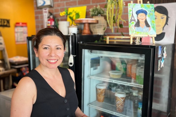 a woman holding a plate of food